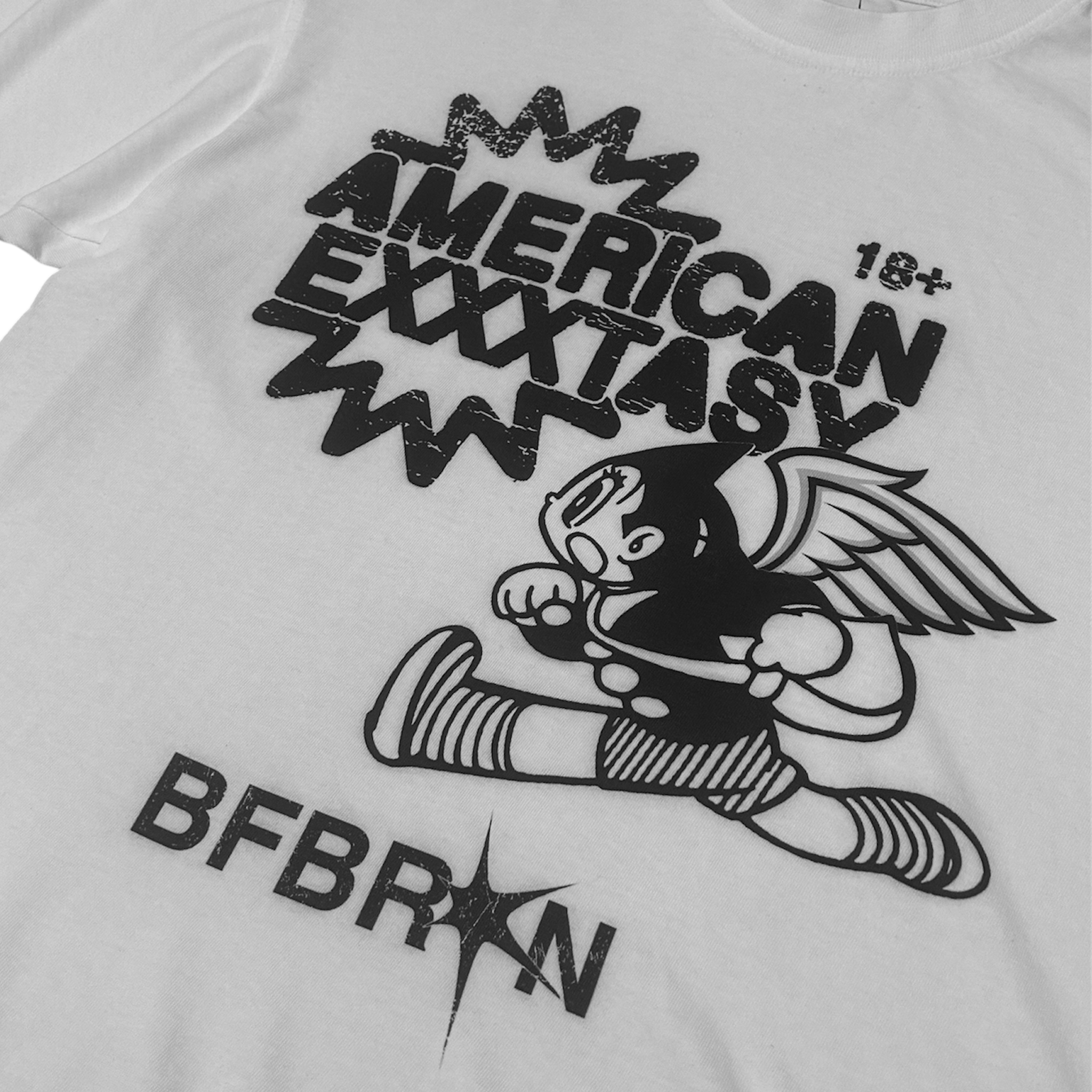 White t-shirt with black graphic design featuring a character and text on a white background